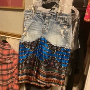 Handmade from a size 4 pair of American Eagle shorts from 2000 , designer fabric